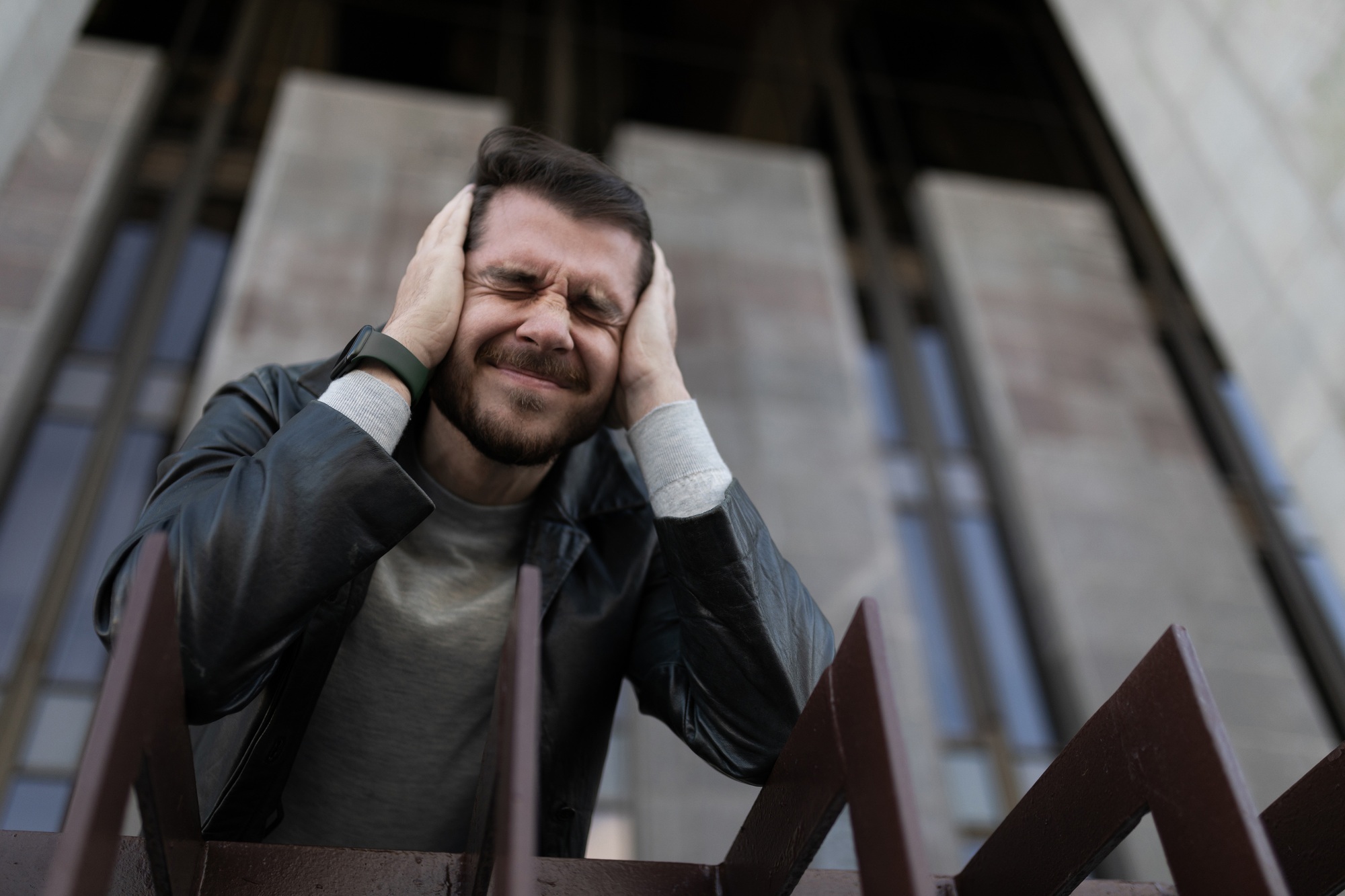portrait of a man in the moment of panic attacks